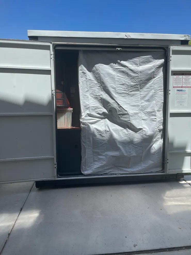 King Ceaser's Moving — storage container loaded for move