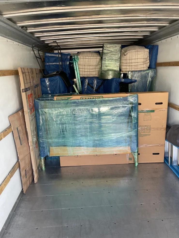 King Ceaser's Moving — fully loaded moving truck