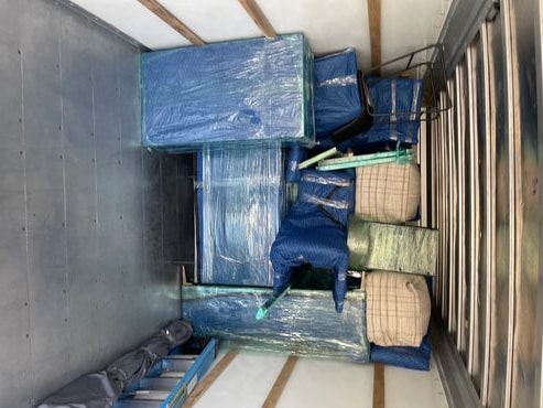 King Ceaser's Moving — TV mounted and dresser wrapped for protection