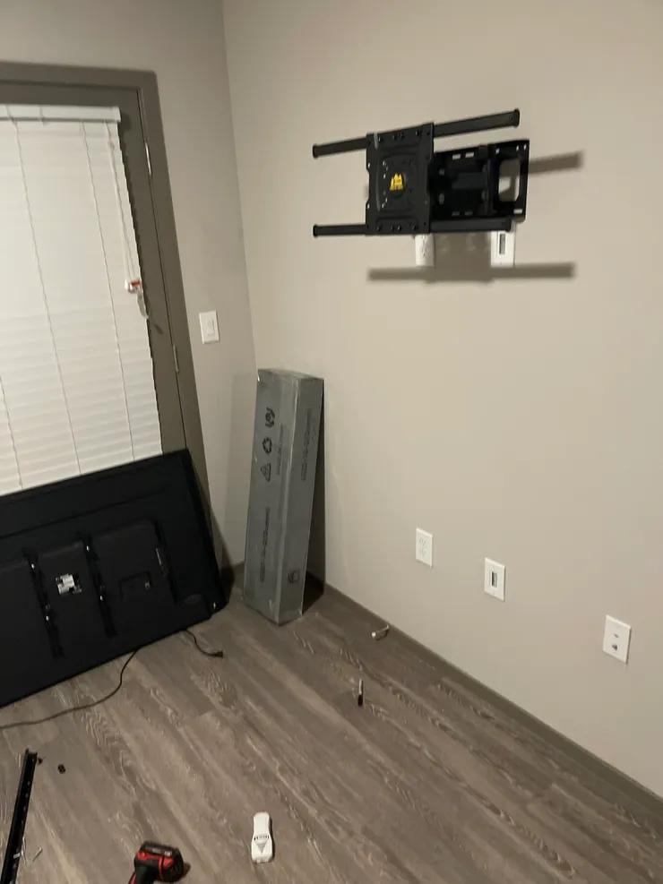 King Ceaser's Moving — TV mount installation during move